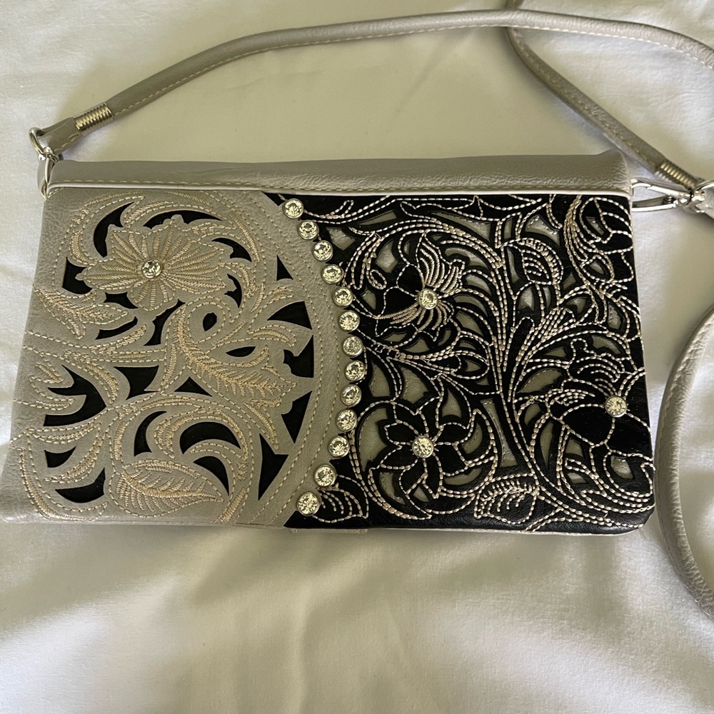 Sophisticated Silver and Black Clutch with Ornate Design